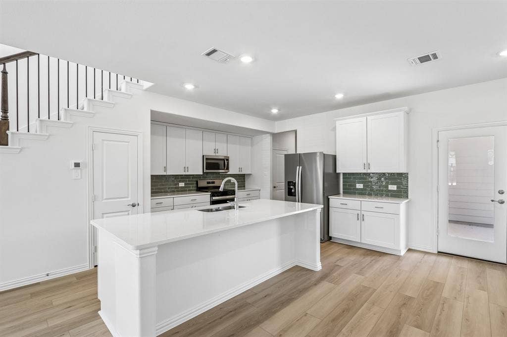 2716 Teton Street, Corinth, TX 76210 Photo is not of the actual home, but is an inspirational photo of builder’s model home and may depict options, furnishings, and/or decorator features that are not included.