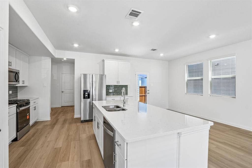 2716 Teton Street, Corinth, TX 76210 Photo is not of the actual home, but is an inspirational photo of builder’s model home and may depict options, furnishings, and/or decorator features that are not included.