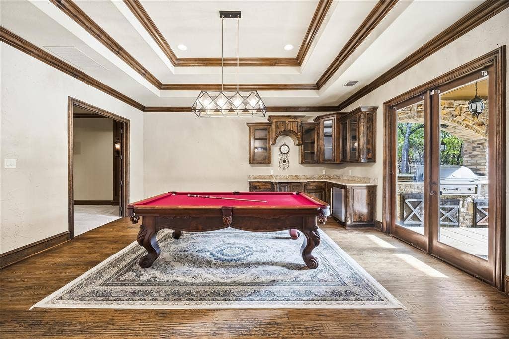 1739 Bison Meadow Lane, Heath, TX 75032 DownStairs GmRm in Main home. 1 of 5 living in main home.