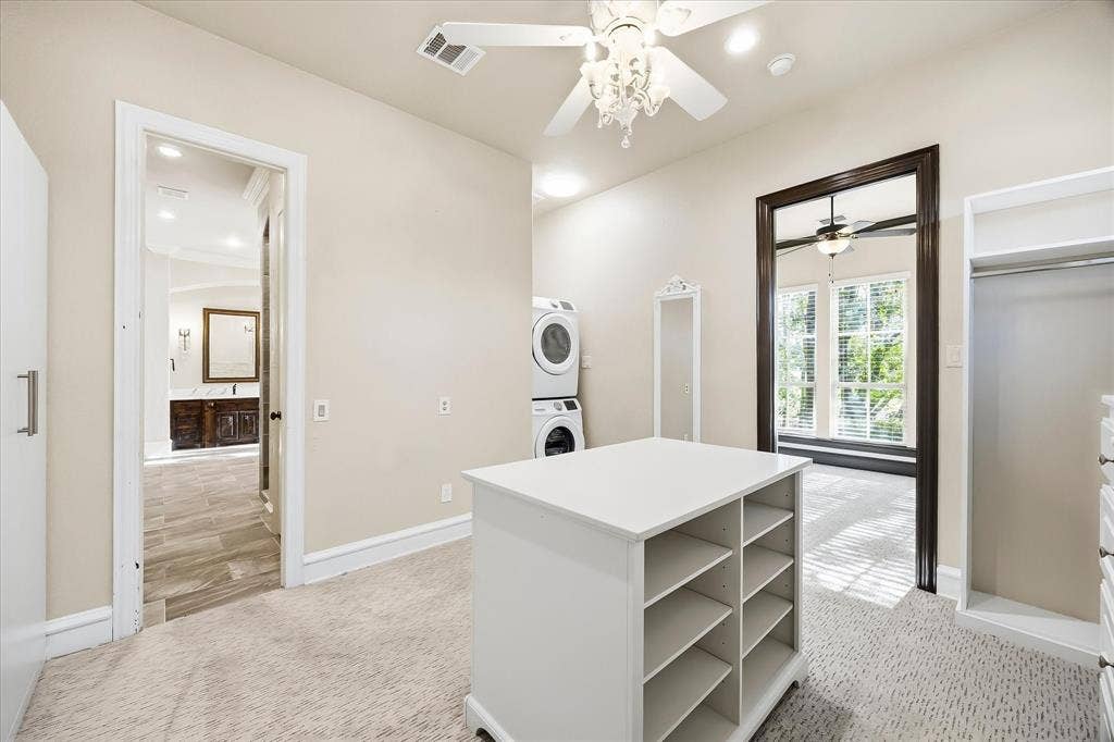 1739 Bison Meadow Lane, Heath, TX 75032 Primary Closet with W/D.
