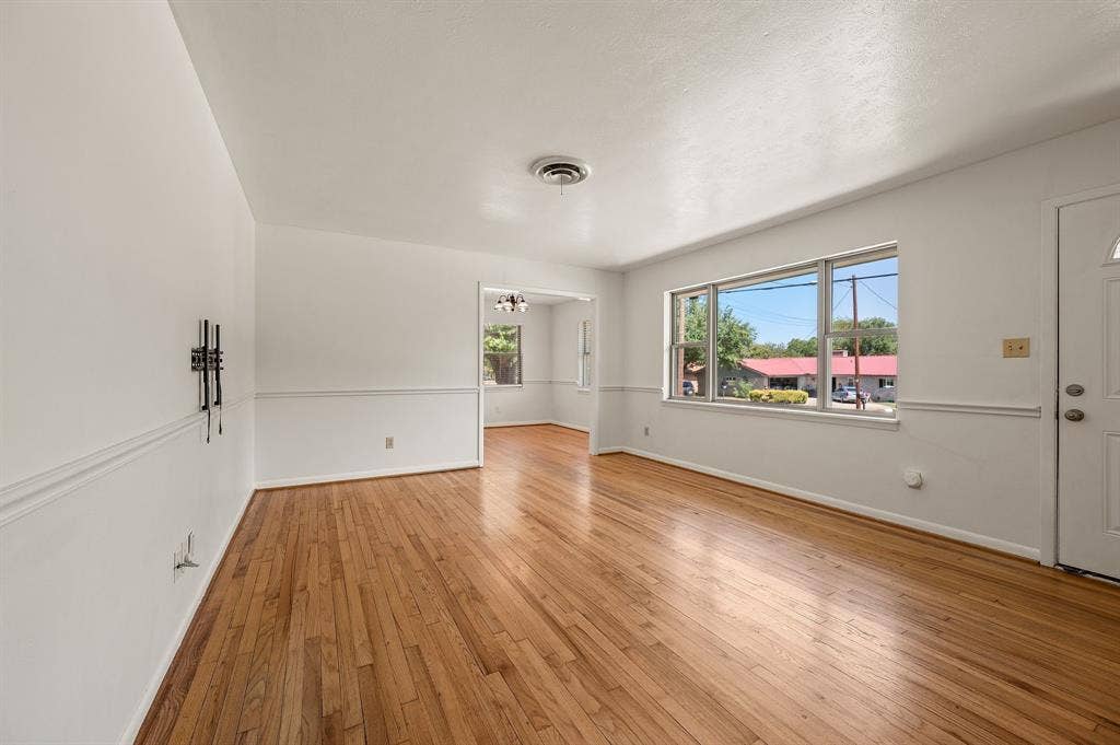 1134 Usher Street, Benbrook, TX 76126 Living Room with Hardwood Floors & Lots of Natural Light