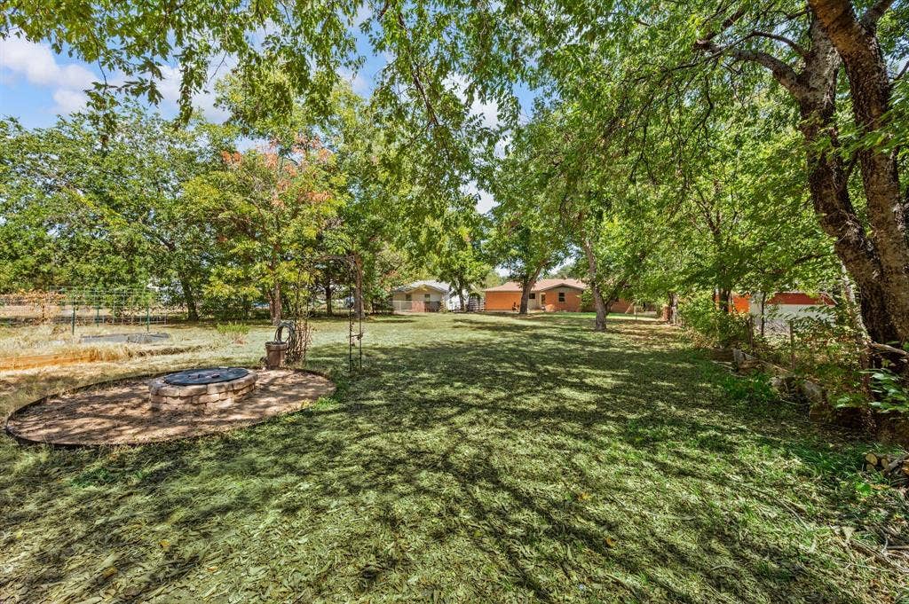 1134 Usher Street, Benbrook, TX 76126 Enjoy the Fire Pit with Friends & Family!