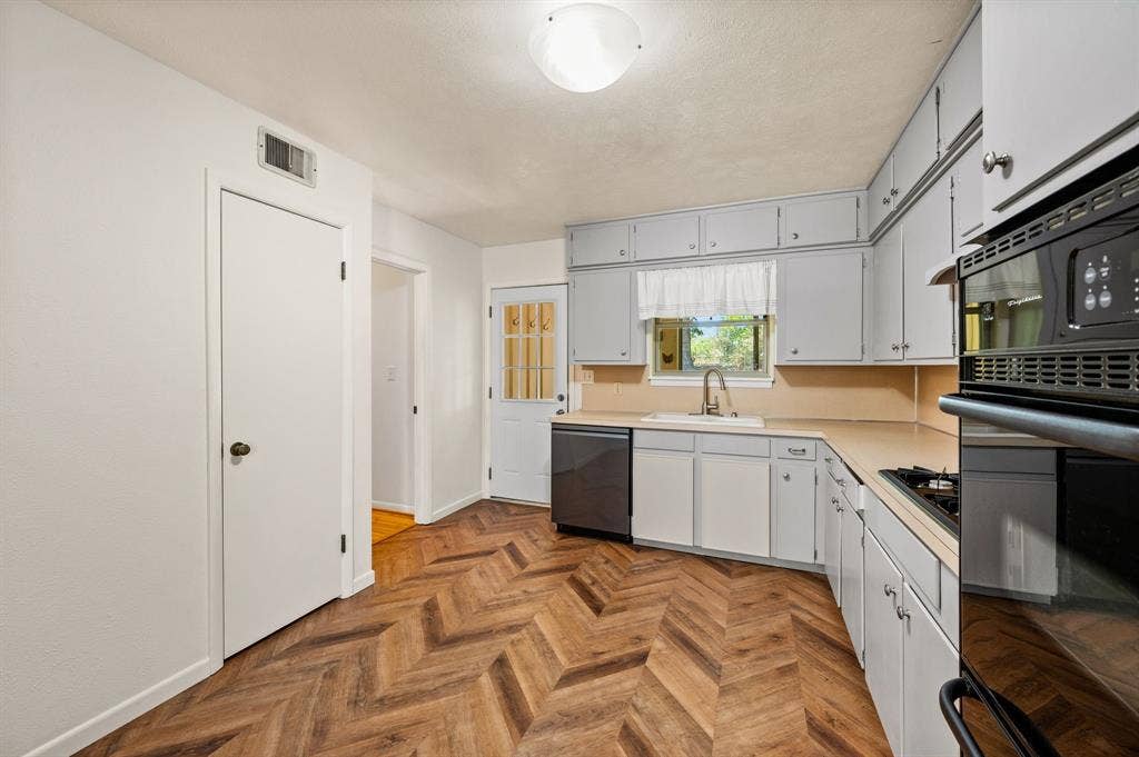 1134 Usher Street, Benbrook, TX 76126 Notice the Beautiful Updated Flooring!
