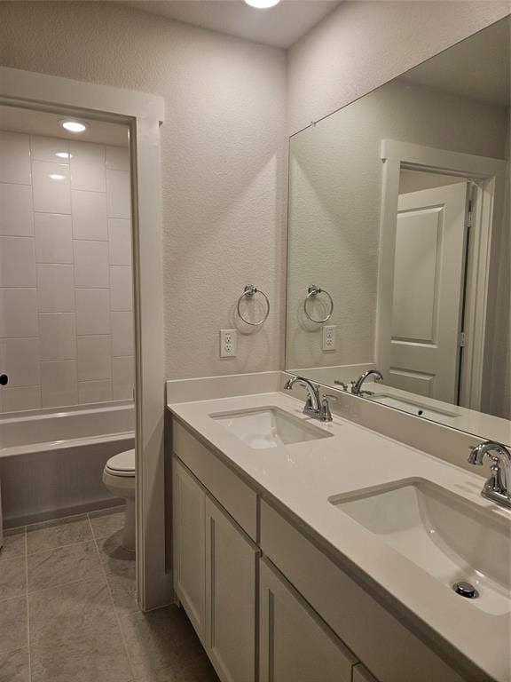 221 Chestnut Street, Celina, TX 75009 Dual vanity with integral sinks, light-toned countertops, and chrome fixtures