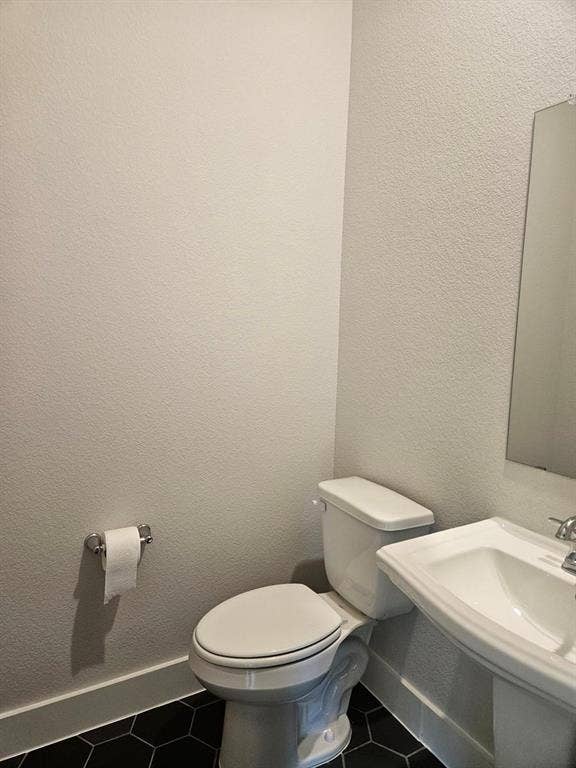 221 Chestnut Street, Celina, TX 75009 White pedestal sink with chrome faucet
