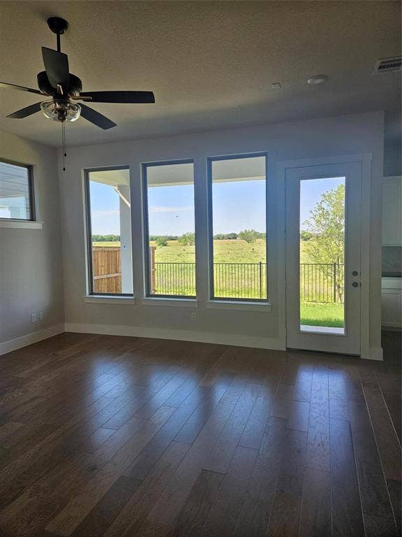 221 Chestnut Street, Celina, TX 75009 Wood-finish flooring, multiple windows, ceiling fan, glass-panel door, and recessed lighting