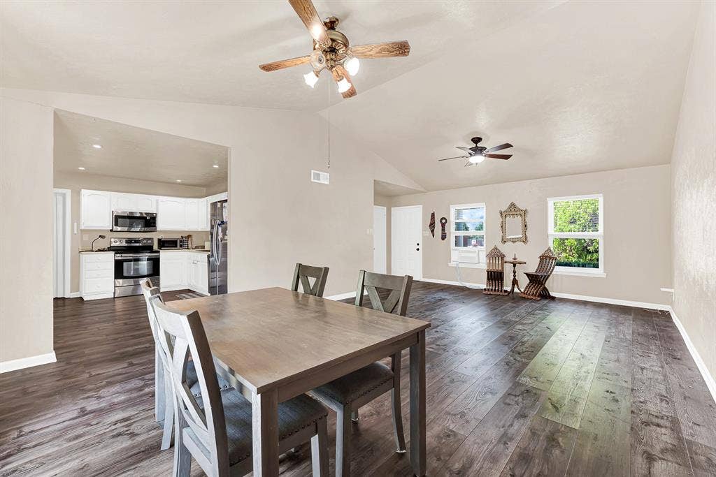 108 Kingsbridge Drive, Garland, TX 75040 Wood-finish flooring, ceiling fan, white window blinds, and built-in closet