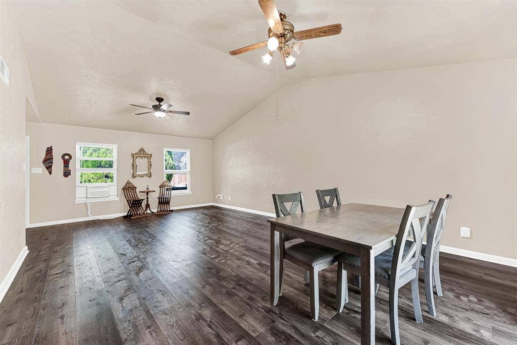 108 Kingsbridge Drive, Garland, TX 75040 Built-in vanity with dual sinks, overhead lighting, and extensive mirror space