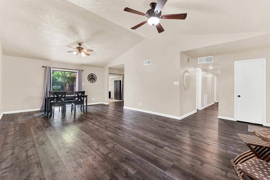 108 Kingsbridge Drive, Garland, TX 75040 Vaulted ceiling, wood-finish flooring, recessed lighting, and ceiling fan