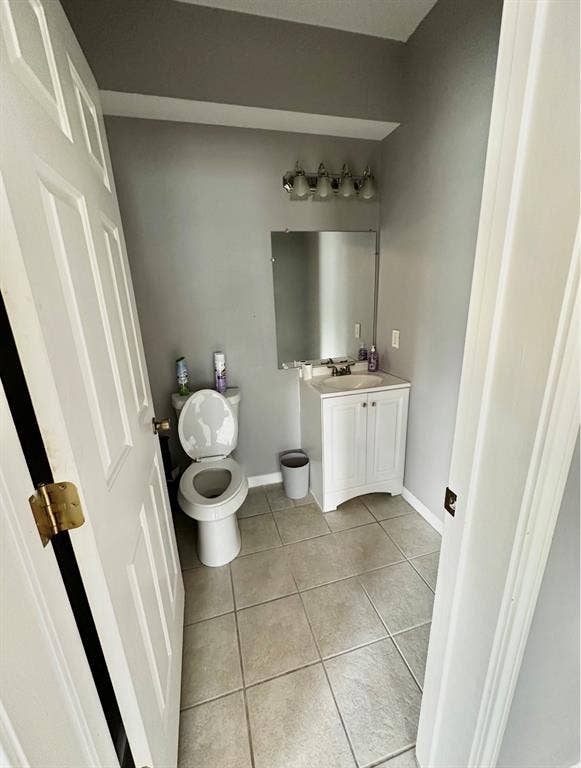 5205 Hudson Bend Road, Austin, TX 78734 Tile flooring with a white vanity and integrated sink