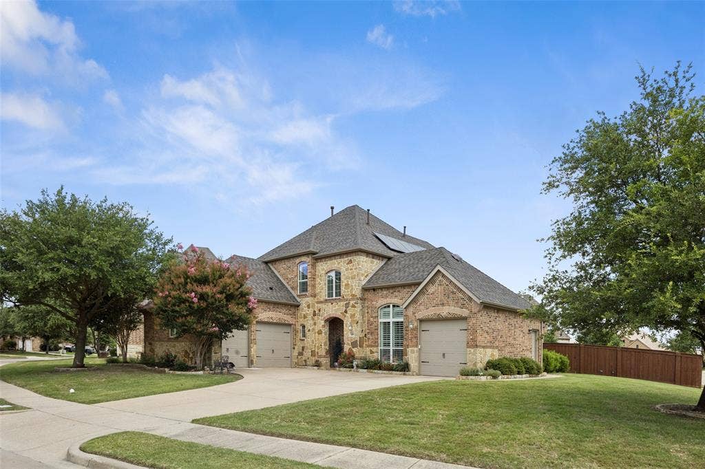 1000 Fenwick Lane, Forney, TX 75126 Brick and stone exterior with arched entryways