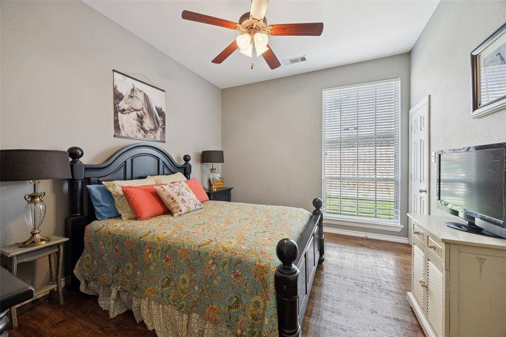 1000 Fenwick Lane, Forney, TX 75126 Vaulted ceiling, wood-finish flooring, ceiling fan, and window with blinds