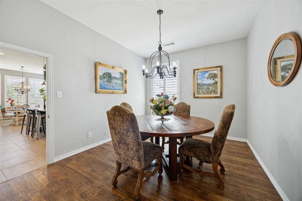 1000 Fenwick Lane, Forney, TX 75126 Wood-finish flooring with white trim
