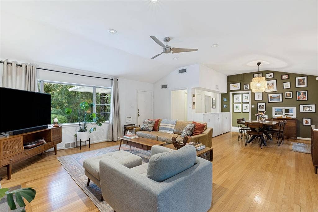 737 N Hampton Road, Dallas, TX 75208 The open relationship between Living and Dining spaces gives the home an easy, informal flow.