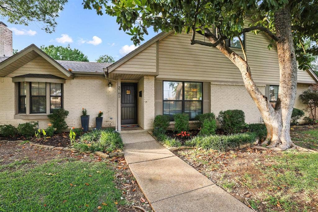 Inviting front entry with landscaped walkway