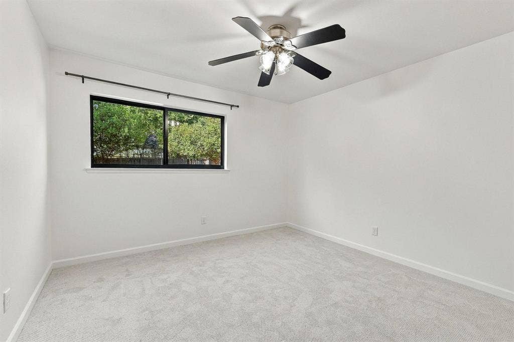Bedroom 2 with fresh paint and carpet