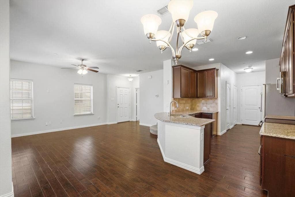 6529 Rutherford Road, Plano, TX 75023 A view from the Breakfast Area to the Family Room