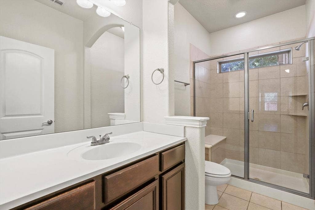 6529 Rutherford Road, Plano, TX 75023 Ensuite bath for Bedroom #2 on the first floor.