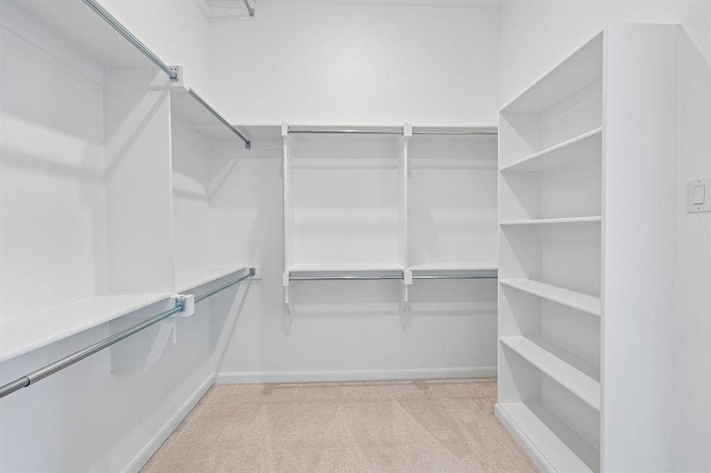 15828 Amber Street, Frisco, TX 75033 Your dreamy owner's closet features seasonal hanging racks and ample room for two!