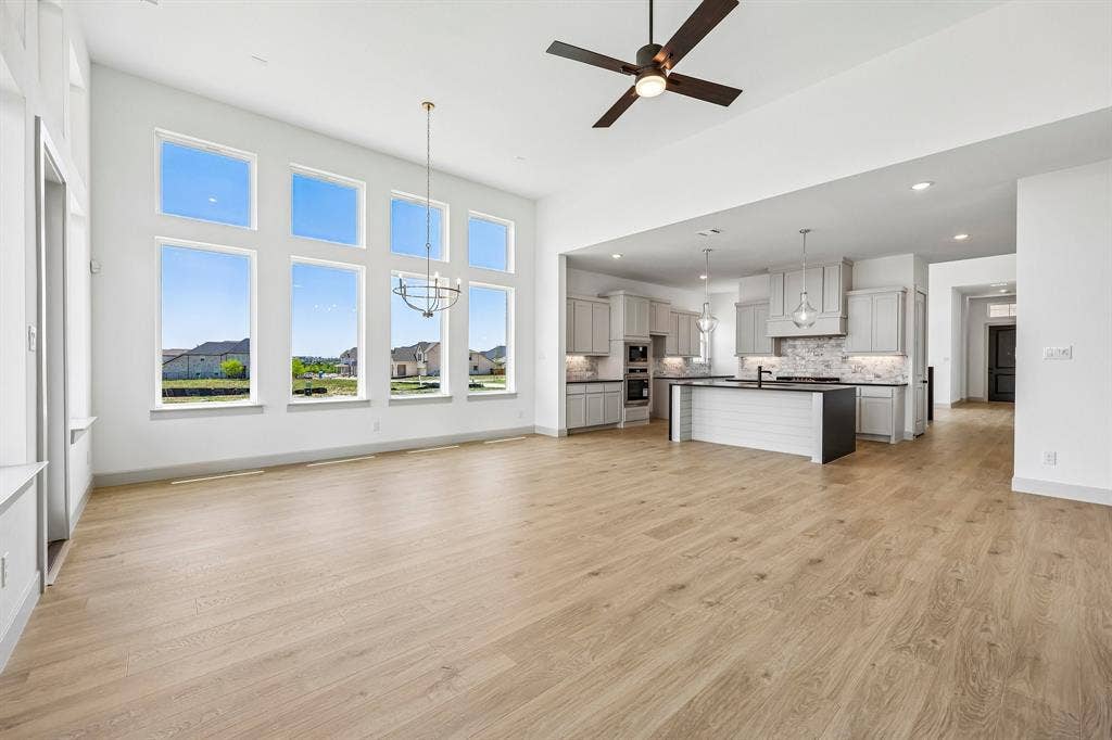 15828 Amber Street, Frisco, TX 75033 The open and flowing design in our Genevieve floor plan is an entertainer's dream home!