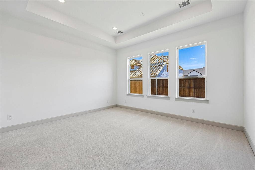 15828 Amber Street, Frisco, TX 75033 The light filled owner's suite is located at the back of the home for additional privacy.