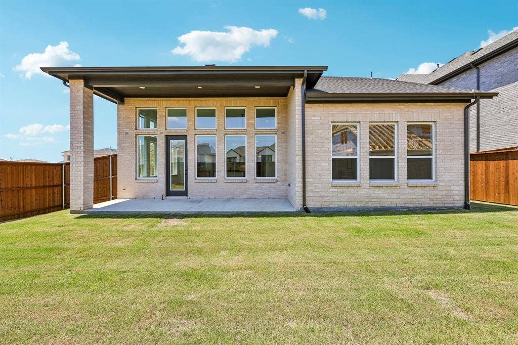 15828 Amber Street, Frisco, TX 75033 No shortage of summertime family fun in this fenced back yard with spacious covered porch!