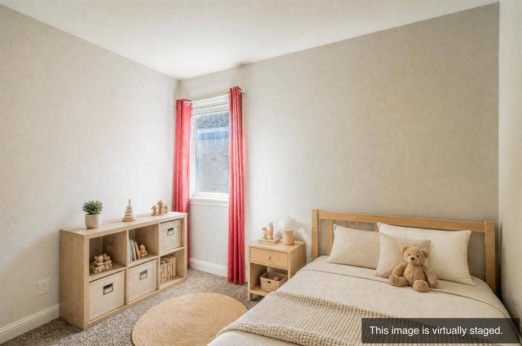 2041 St Andrews Way, Argyle, TX 76226 Carpeted room with a single window, featuring a light-toned wooden bed frame and a complementary wooden nightstand