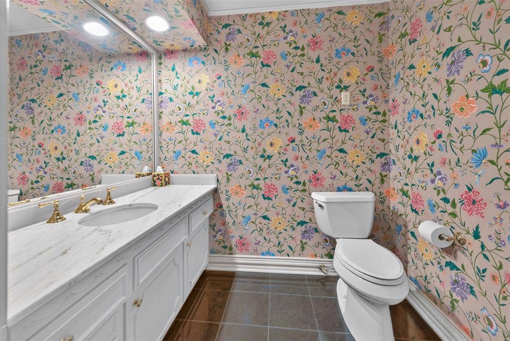 702 Mulberry Drive, Athens, TX 75751 White vanity with paneling and brass hardware