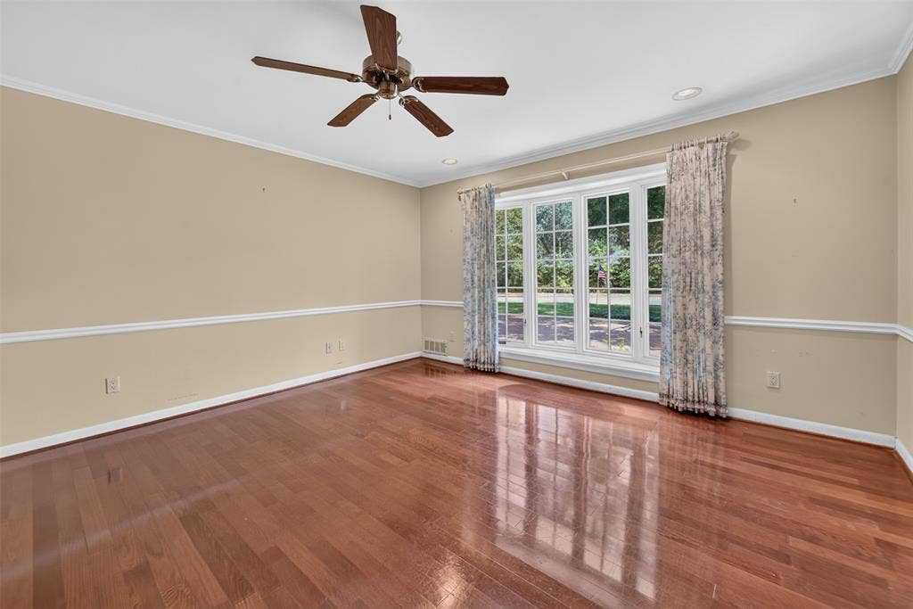 702 Mulberry Drive, Athens, TX 75751 Hardwood flooring, crown molding, chair rail molding, recessed lighting, and a ceiling fan