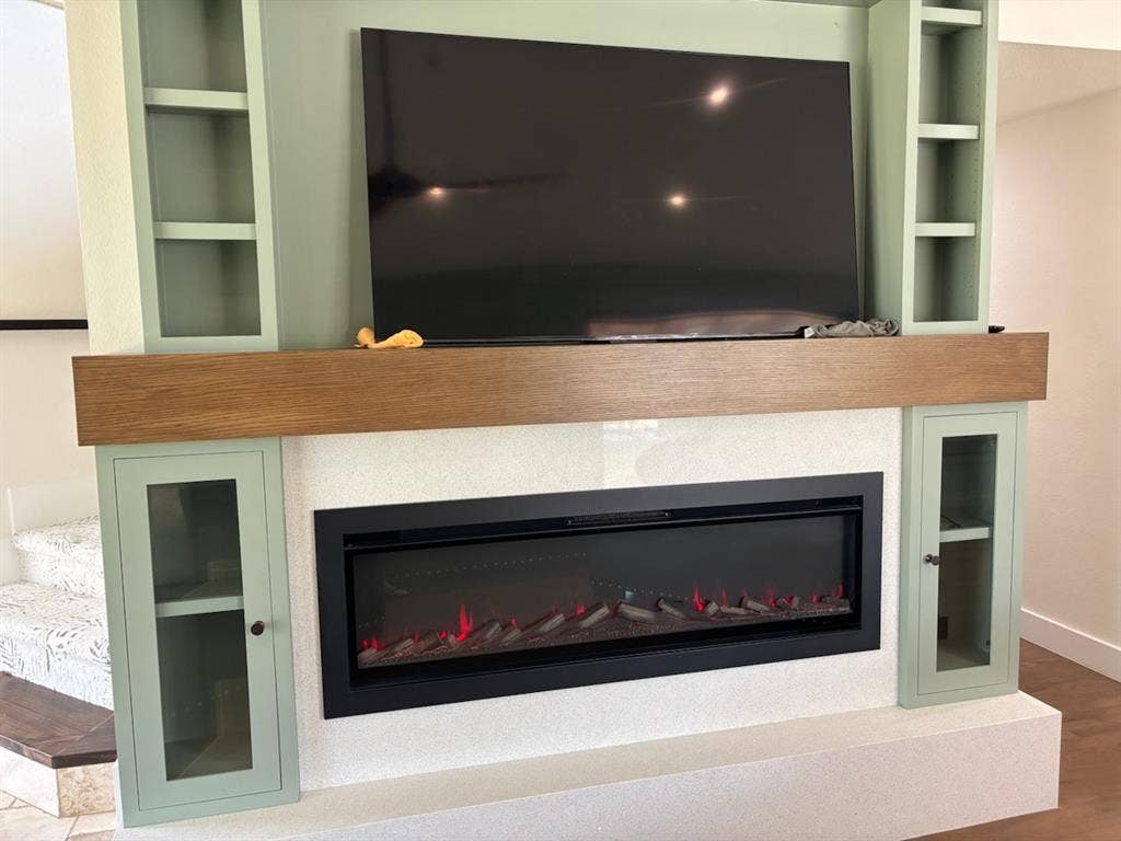 820 Raywood Circle, Plano, TX 75075 Built in TV shelving and fireplace that changes flame color based on your mood.