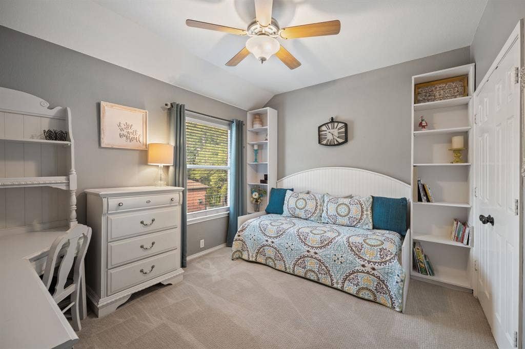 3202 Harbor Pointe Drive, Rowlett, TX 75088 Spacious secondary bedroom with built in day bed and shelves