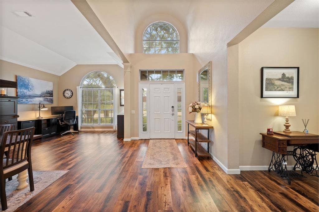 3202 Harbor Pointe Drive, Rowlett, TX 75088 Grand entryway featuring gorgeous flooring, living flex space used as an office and large dining room