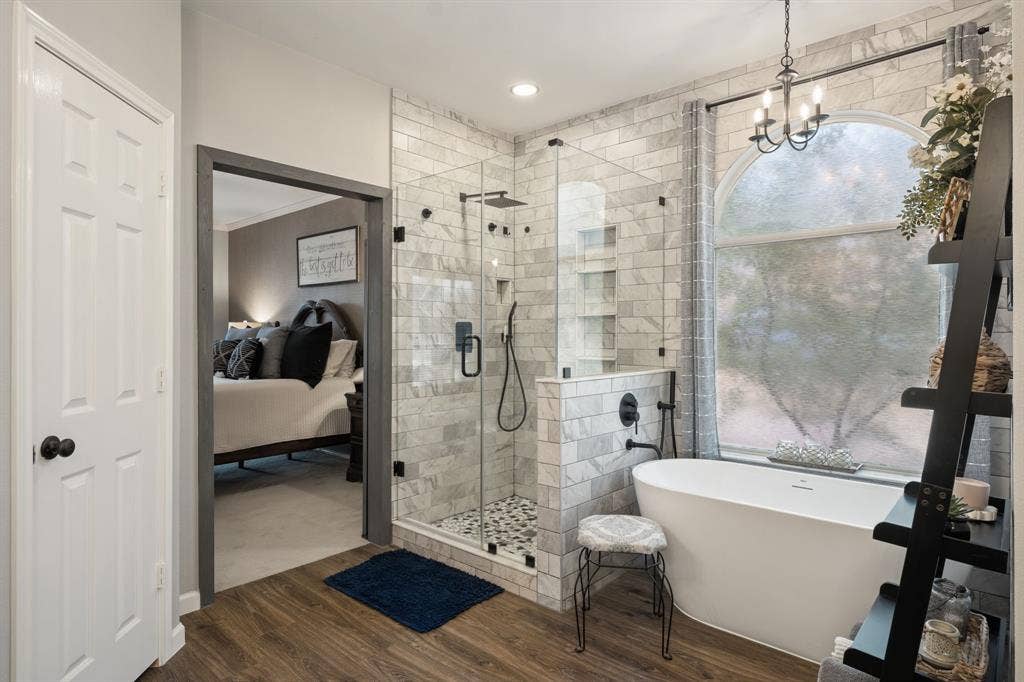 3202 Harbor Pointe Drive, Rowlett, TX 75088 Bathroom featuring a freestanding soaking tub, walk-in frameless shower