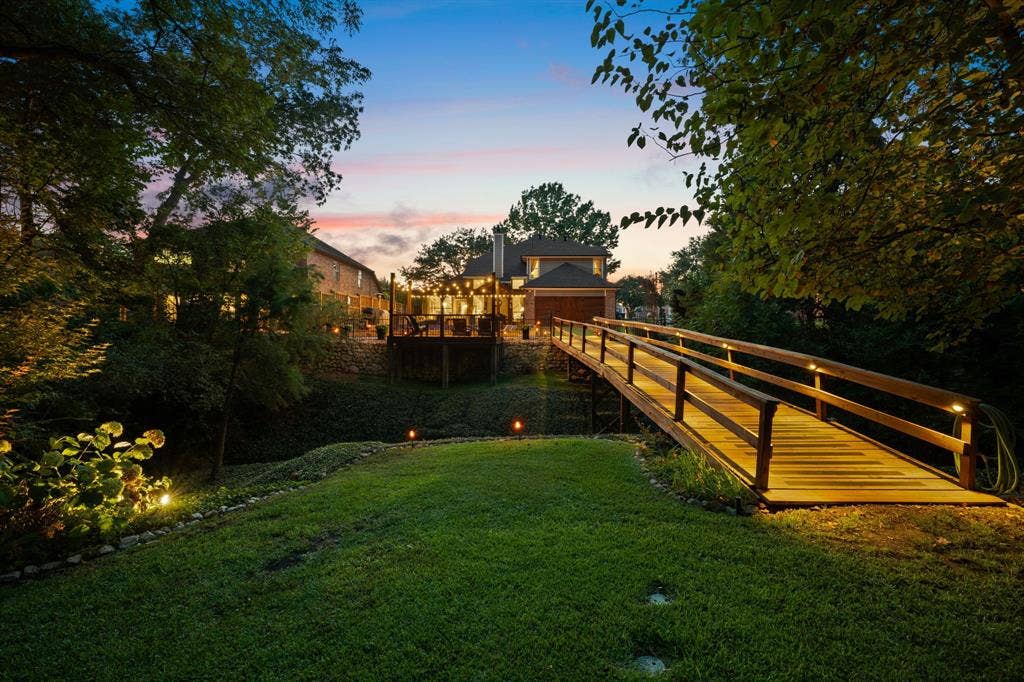 3202 Harbor Pointe Drive, Rowlett, TX 75088 View of bridge and home from the back part of the lot