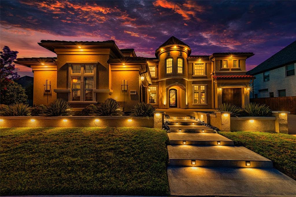 13018 Seattle Slew Street, Frisco, TX 75035 Stucco exterior with multiple architectural elements, including a round turret, Spanish tilted roof