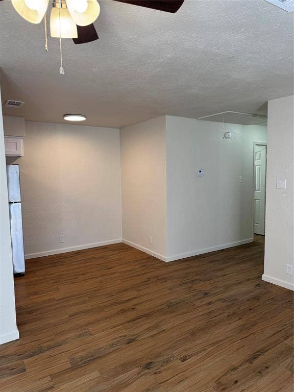 1104-1106 Mulkey Lane, Denton, TX 76209 Wood-finish flooring, white walls, ceiling fan, and recessed lighting fixtures