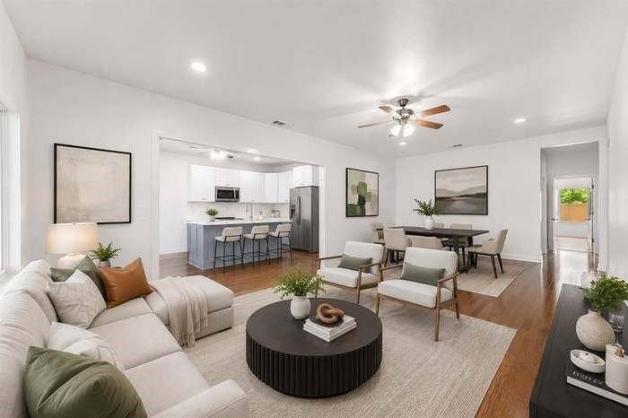 2405 Monroe Street, Commerce, TX 75428 Hardwood-finish flooring, recessed lighting, and a ceiling fan in the main living space