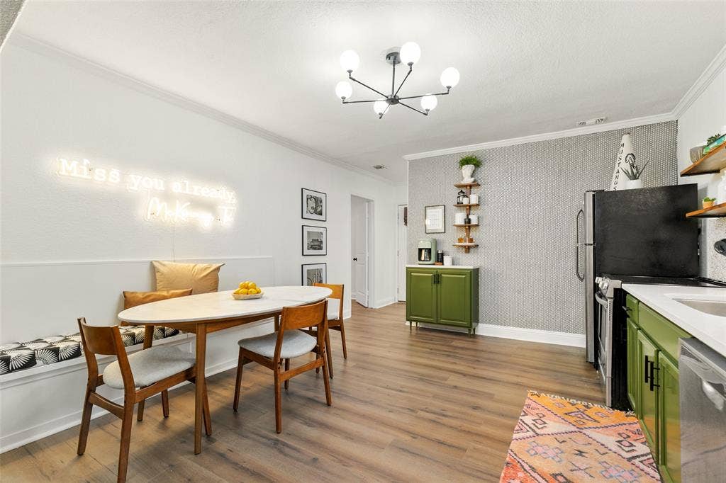 214 Short Street, McKinney, TX 75069 Wood-finish flooring throughout, complemented by a contemporary ceiling light fixture