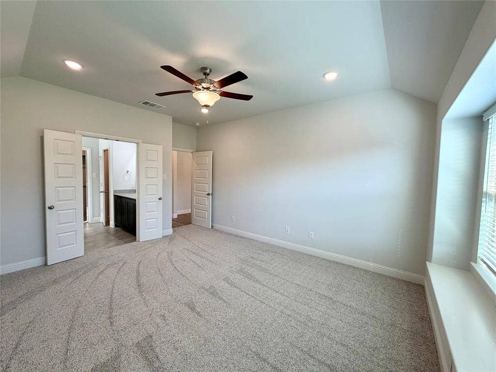 3806 Chicory Court, Melissa, TX 75454 Another view of the the spacious and well-appointed primary bedroom suite, highlighting the elegant design, natural lighting, and overall comfortable layout of the room.