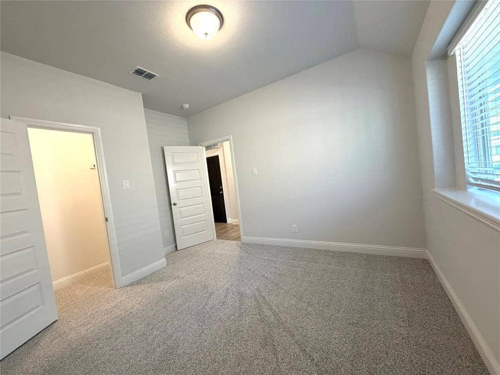 3806 Chicory Court, Melissa, TX 75454 Another view of secondary bedroom 2 with a walk-in closet & a deep window ledge.