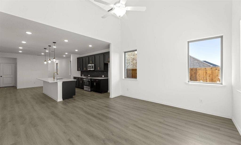 3644 Castle Drive, Celina, TX 75009 Open Kitchen-Living-Dining Room Representative Photo