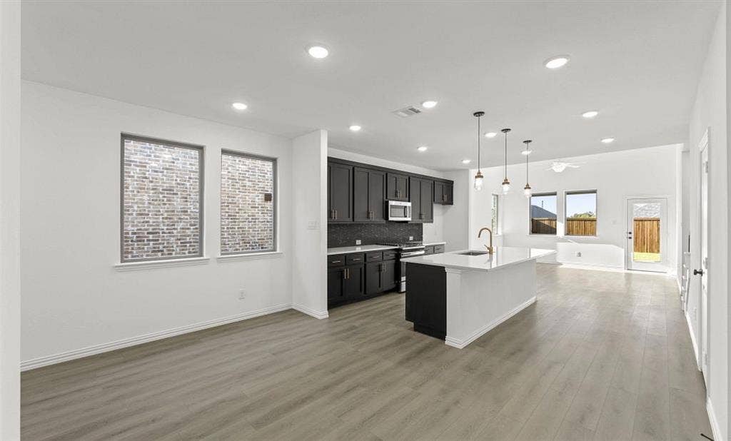 3644 Castle Drive, Celina, TX 75009 Open Kitchen-Living-Dining Room Representative Photo featuring the Noir Collection