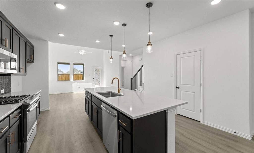 3644 Castle Drive, Celina, TX 75009 Open Kitchen-Living Room Representative Photo featuring the Noir Collection
