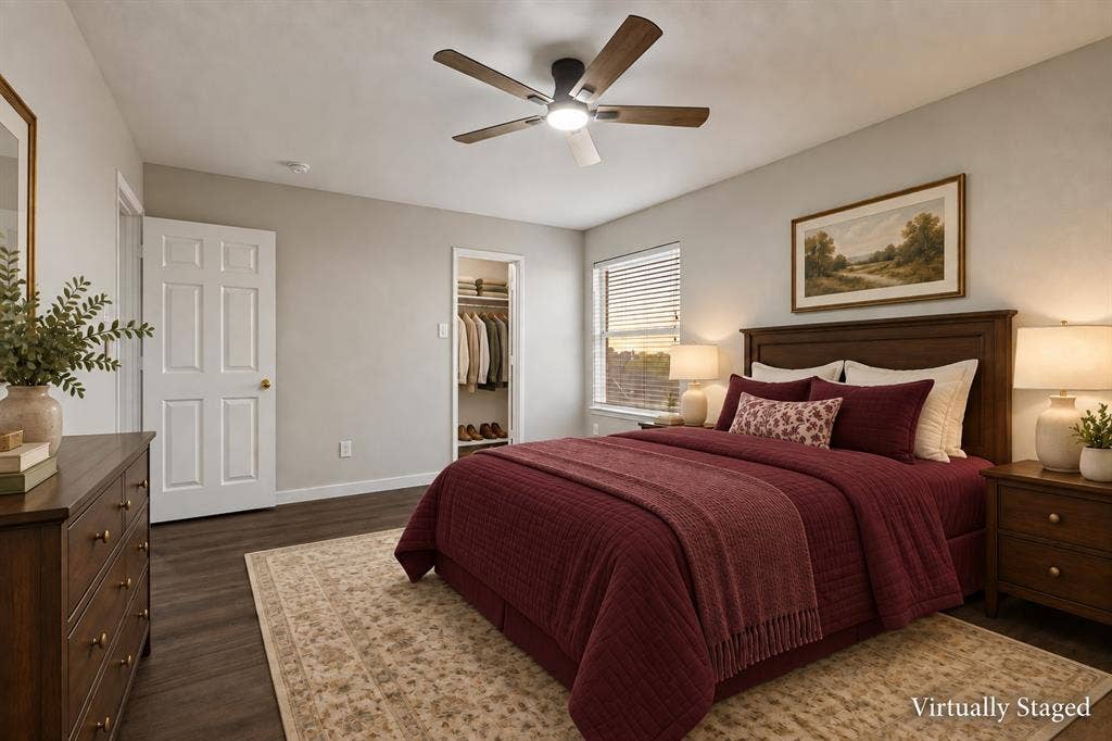 4215 Maidstone Drive, Garland, TX 75043 Wood-finish flooring throughout, bright white walls, integrated ceiling fan with lighting, window with blinds, and an open closet with shelving