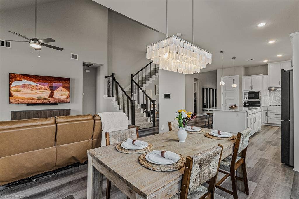 Open modern dining area of 1302 20th St, Argyle, TX in Harvest by Hillwood