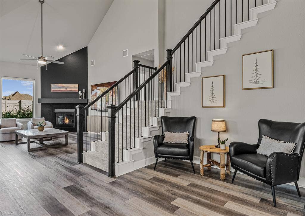 Entrance foyer with stairs and view of living room of 1302 20th St, Argyle, TX in Harvest by Hillwood
