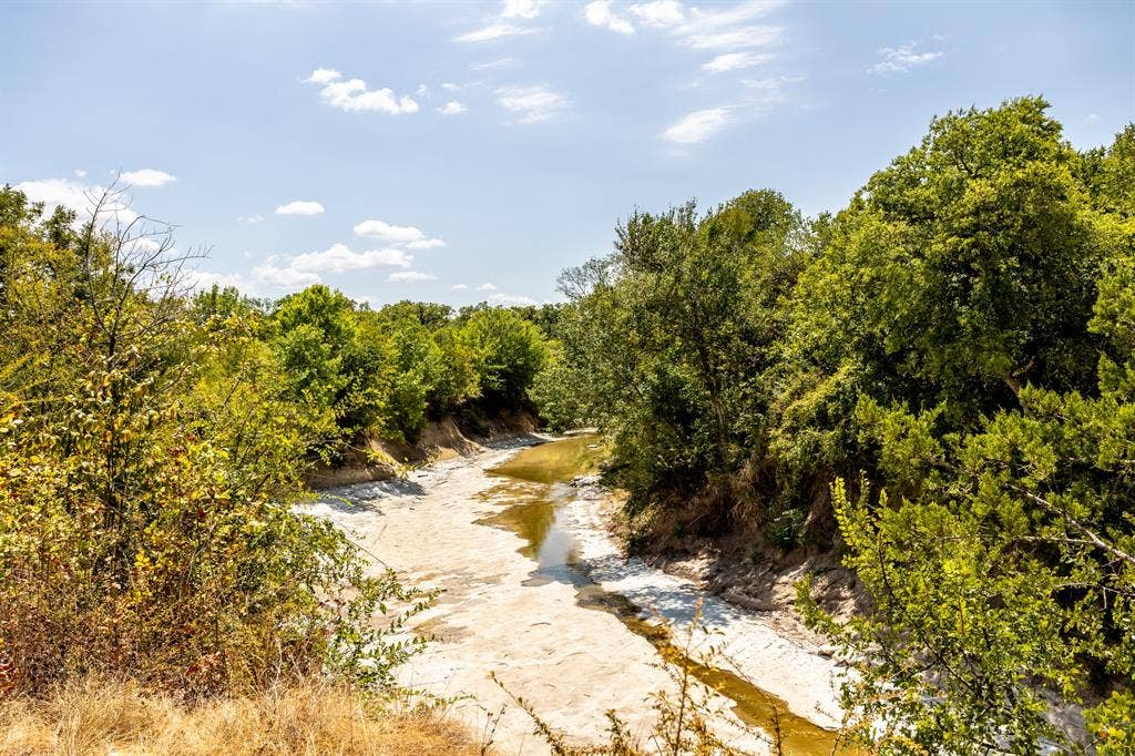 2300 W MAIN Street, Lancaster, TX 75146 Creek is a little low but normally has more water.