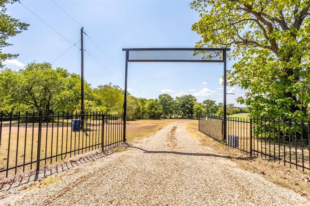2300 W MAIN Street, Lancaster, TX 75146 Enter through electric gate and drive to back of property to the home