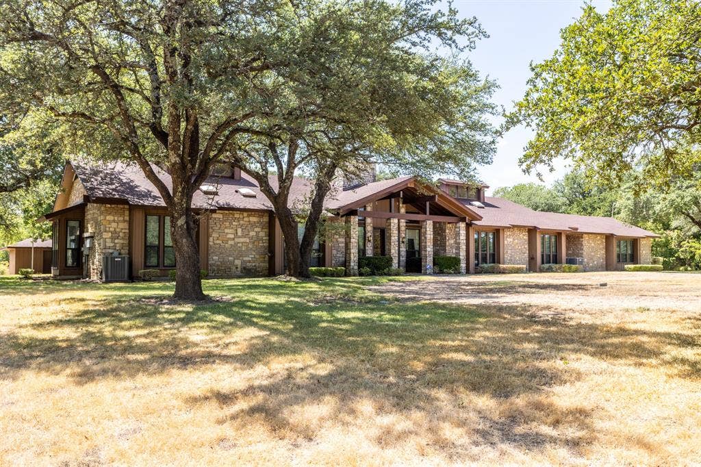 2300 W MAIN Street, Lancaster, TX 75146 Impressive stone and wood mid-century style located on 22.410 acres