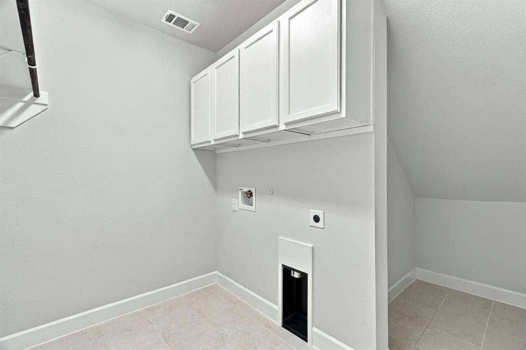 1238 20th Street, Northlake, TX 76226 Laundry with spacious under stair storage or tornado safe spot!